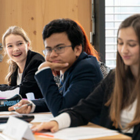 Students at a meeting