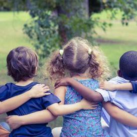 Kids hugging together
