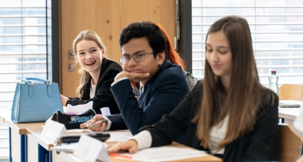 People at a school board meeting